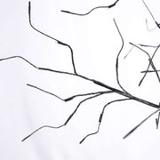 Close-up of Halloween ghost trees with lights branches, showcasing their adjustable twisted forms for spooky décor.